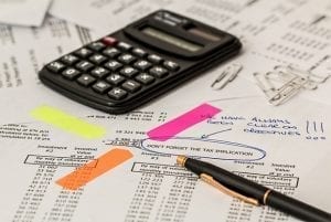receipts, spreadsheets, calculators for tax preparation season